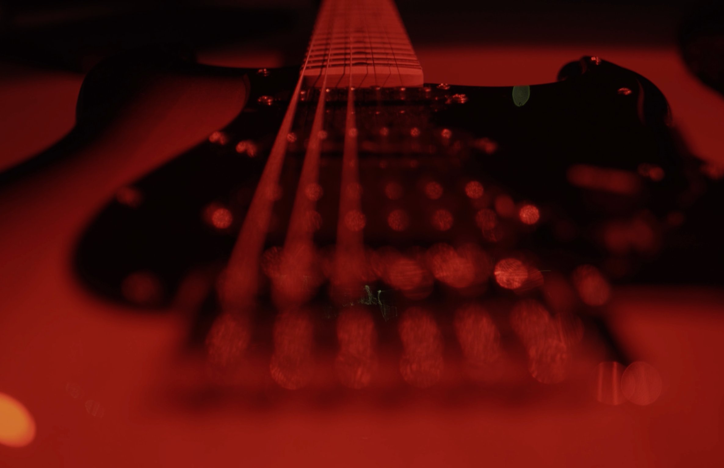 Red-lit guitar