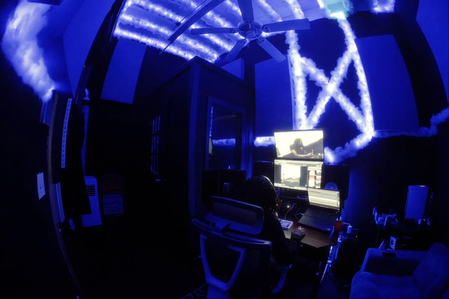 Wide view of the Brooklyn room in blue light